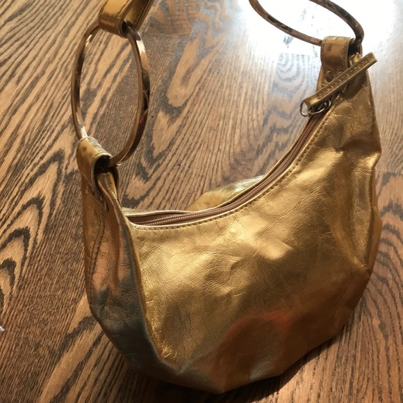 Aldo Handbags - Aldo gold leather mini pocketbook Aldo Handbags - Aldo gold leather mini pocketbook